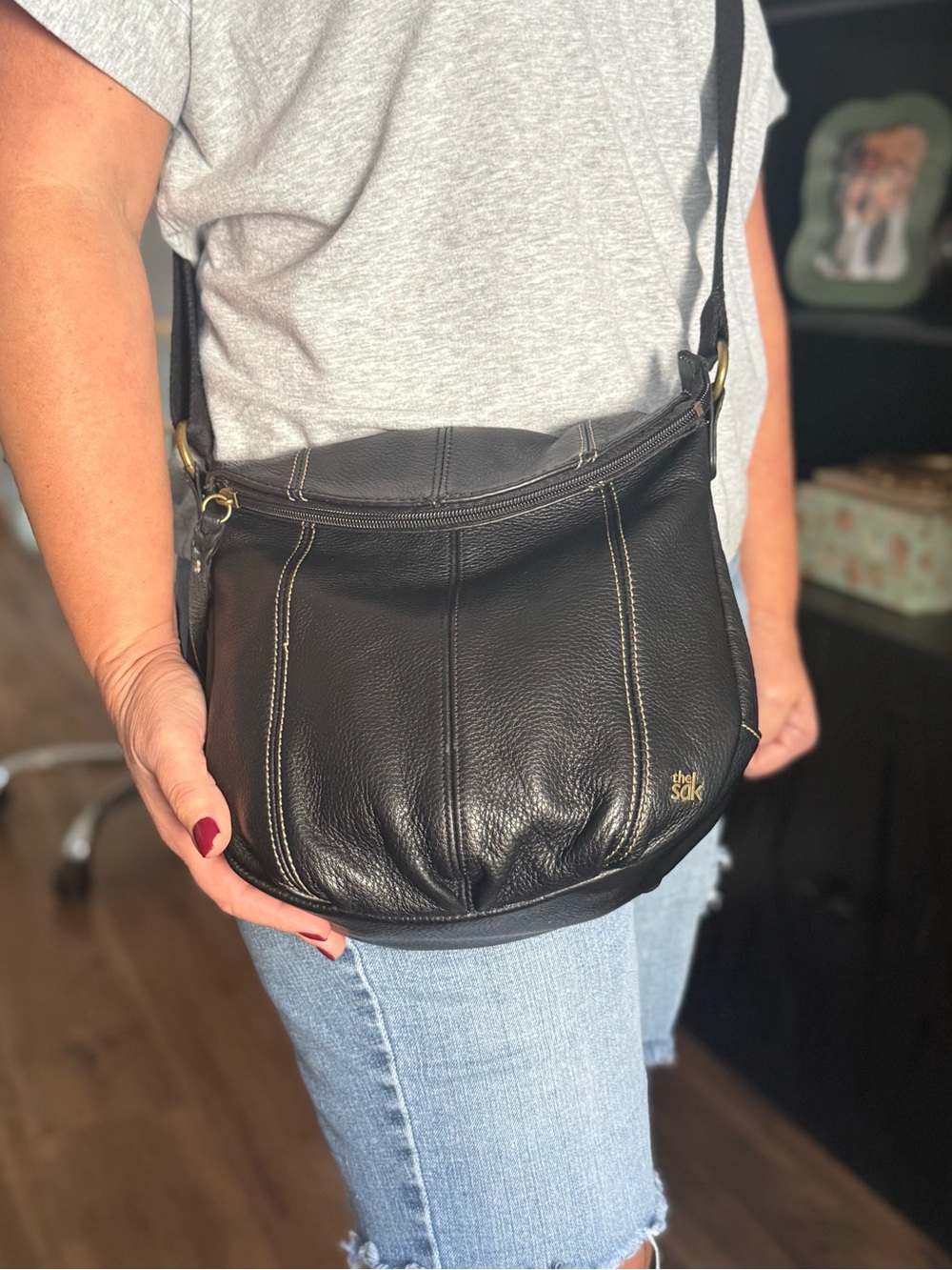The Sak Black Pebbled Deena Leather Flap Crossbody Bag with Contrast Stitching